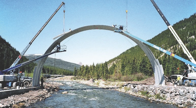Mine site haul road arch stream crossing under construction