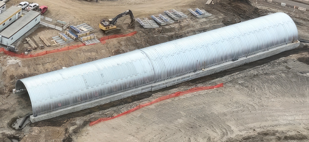 : Full aerial view of oil sands haul road crossing